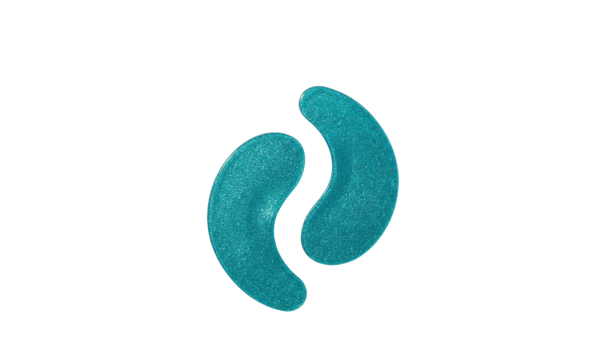 Two glittery teal crescent-shaped gel pads on a solid white background.