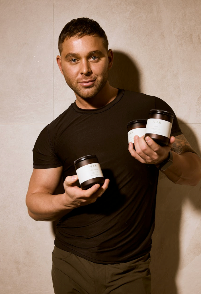 Thom Tullo founder of face pilates holding Noor bath sales from Noor Cosmetics